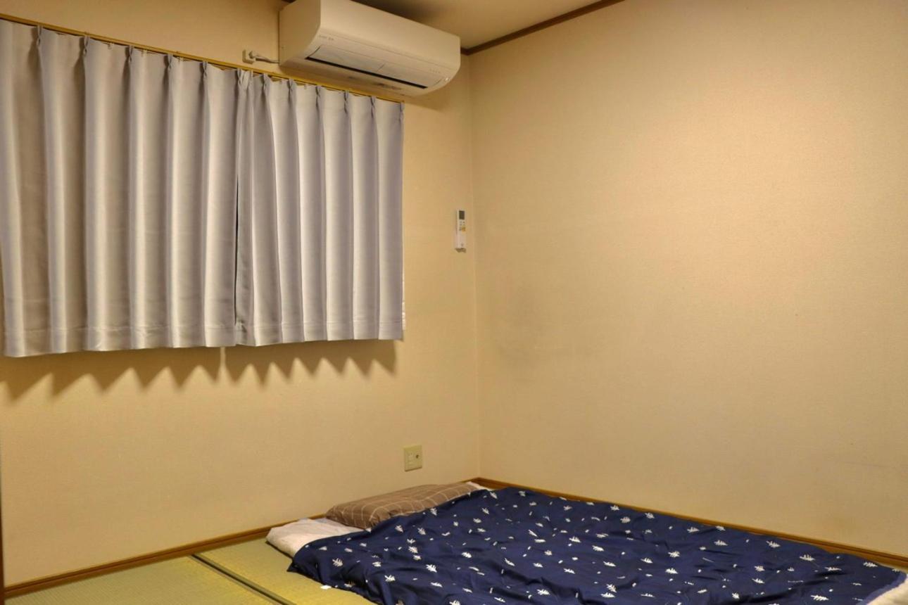 Niji Homestay Ōsaka Extérieur photo